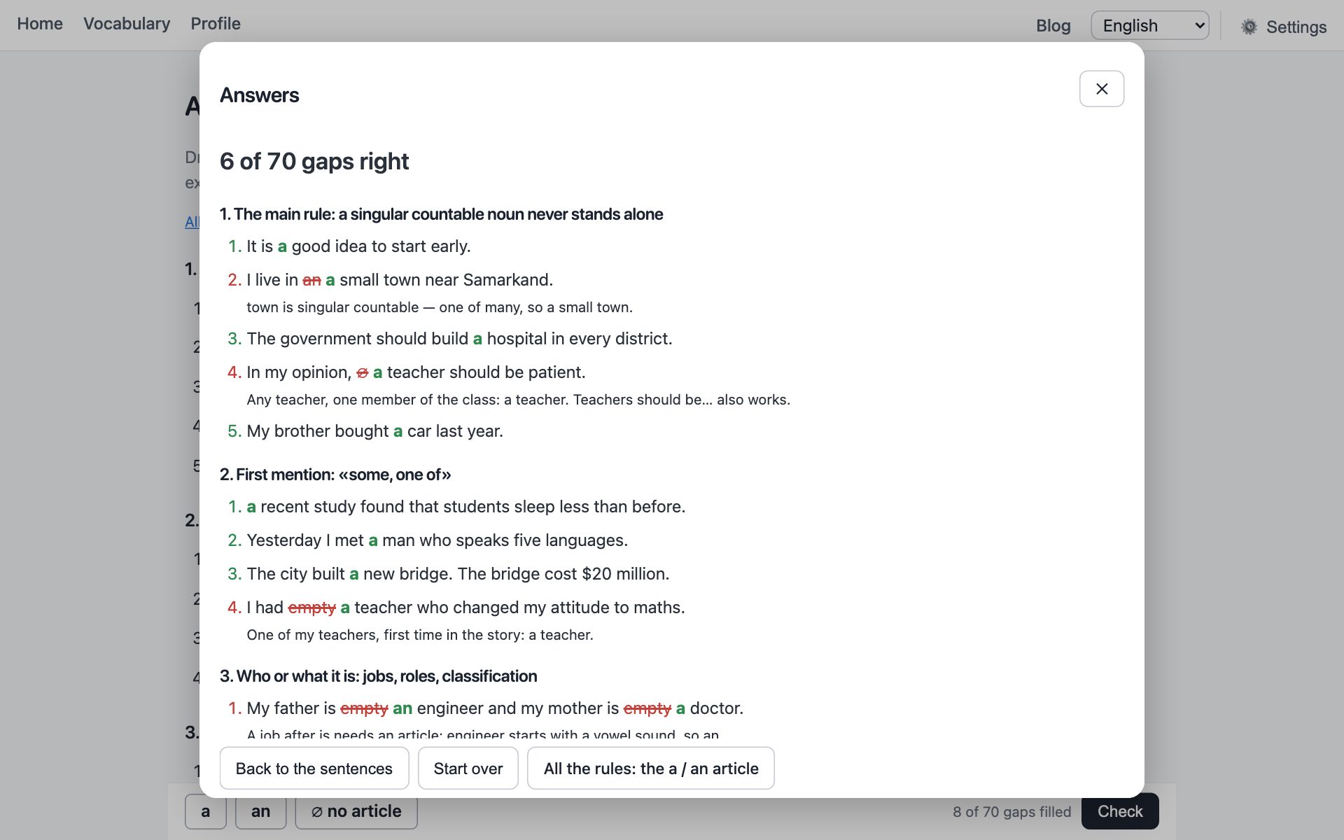 The answers window: a wrong article struck through in red, the right one in green, an explanation below